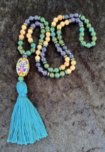Kiwi Lapis, Sunstone, Terra Jasper, Multi-Colored Disc Accents, "Fleur-De-Lis" Mirage Guru, Teal Tassel