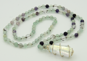 “Crystal Dreams” Fluorite, Aura Quartz Crystal Pendant "Crystal Dreams" Fluorite, Aura Quartz Crystal Pendant