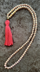 Violet Topaz, Garnet Guru, Red Tassel Violet Topaz, Garnet Guru, Red Tassel